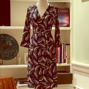 Stylish Wrap dress with 3/4 sleeves.
